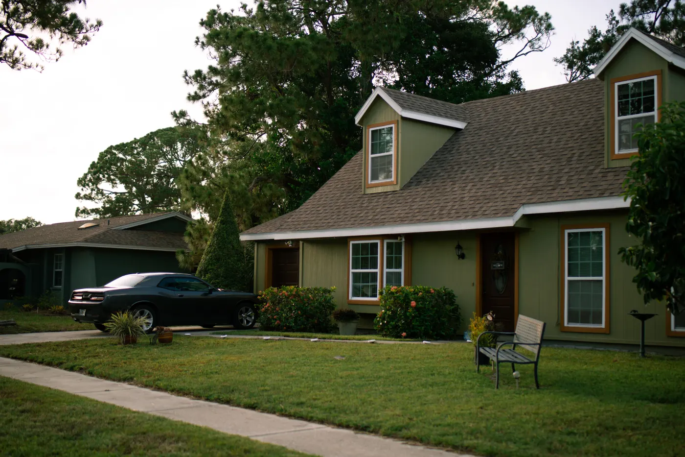 Home and vehicle together in a driveway