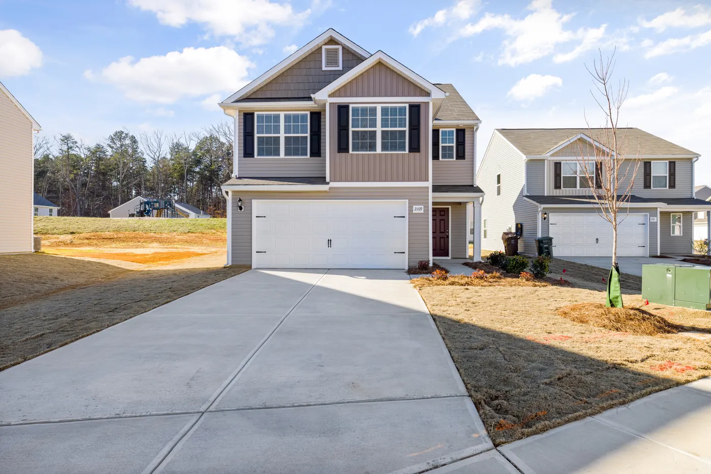 Suburban home exterior representing insurance planning